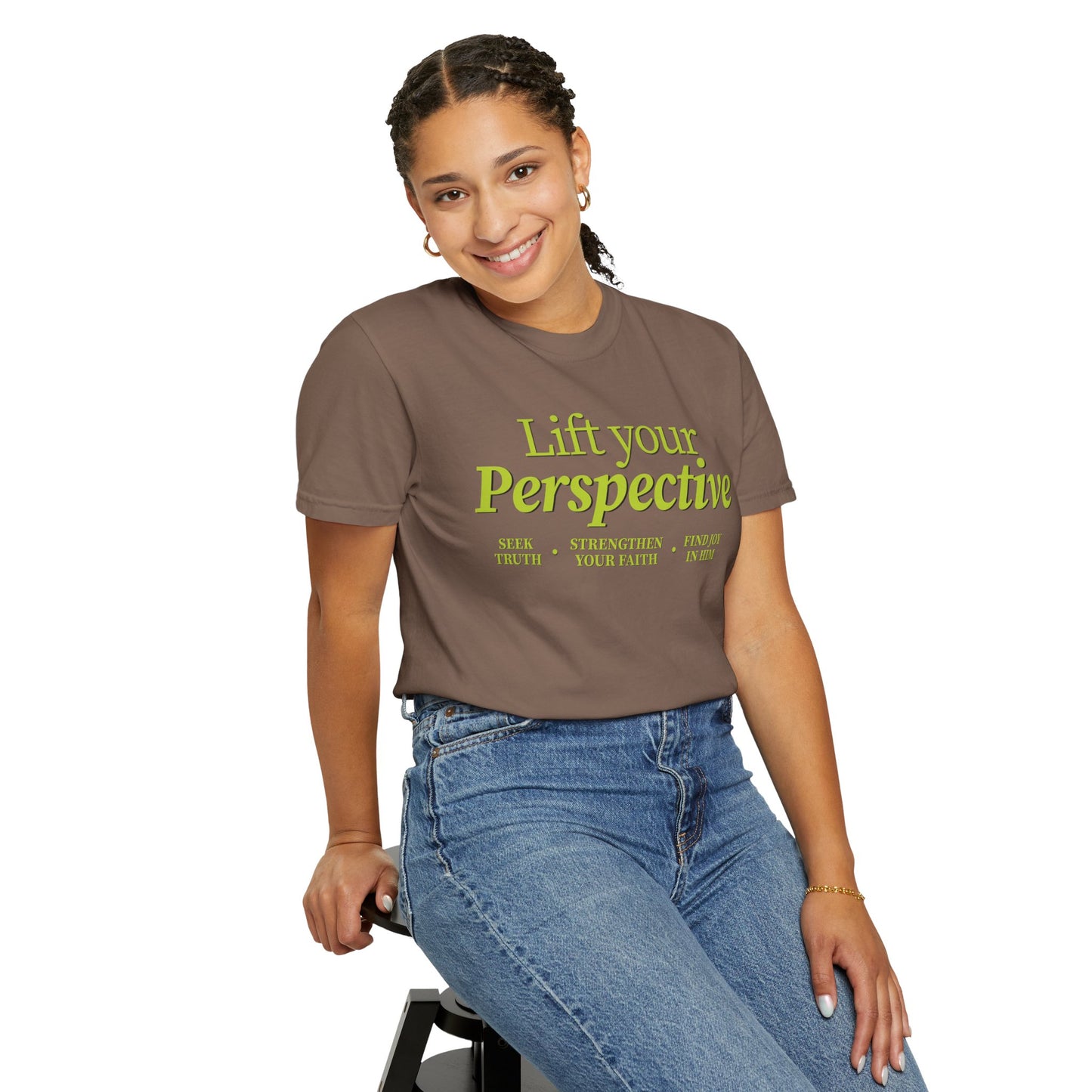 Young adult wearing “Lift Your Perspective” Christian T-shirt in brown, inspired by the How to Pray series.