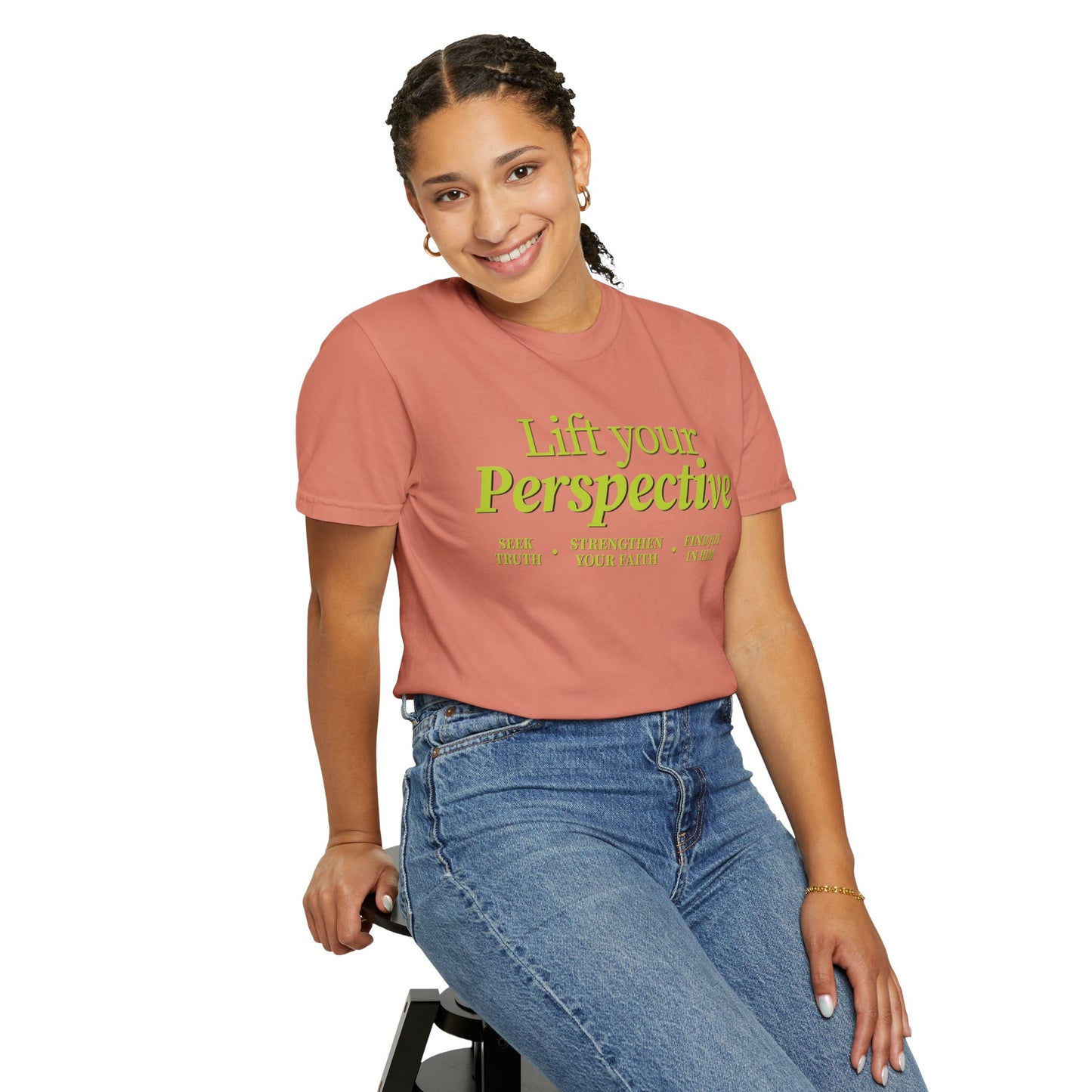 Young adult wearing “Lift Your Perspective” Christian T-shirt in terracotta, inspired by the How to Pray series.