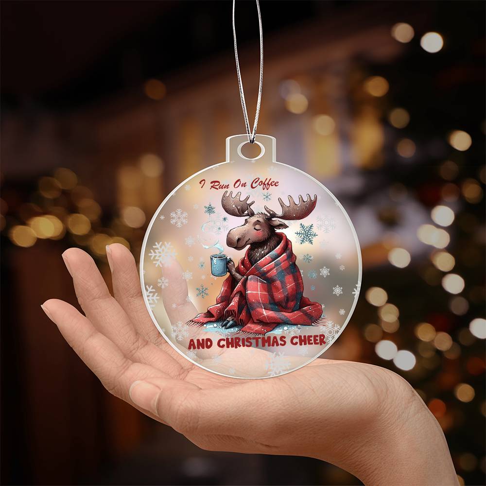 Moose wrapped in blanket holding coffee with "I run on coffee and Christmas cheer" text.