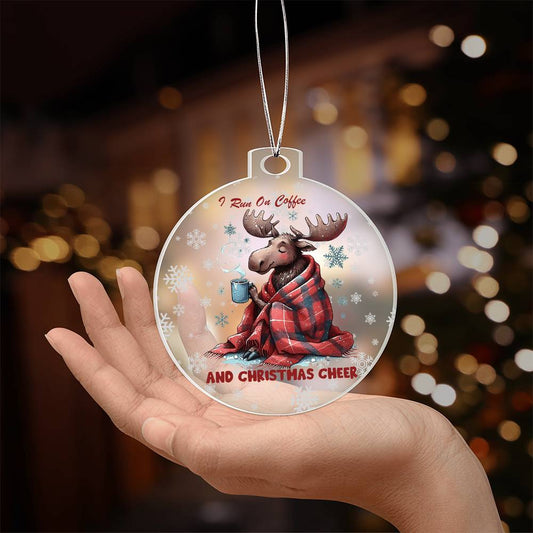 Moose wrapped in blanket holding coffee with "I run on coffee and Christmas cheer" text.