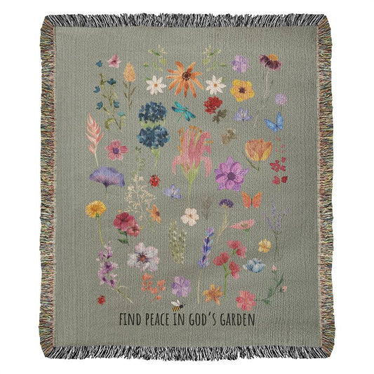 Floral woven blanket with vibrant flowers, bugs, and 'Find Peace in God's Garden' message. Colorful and nature-inspired Christian blanket.
