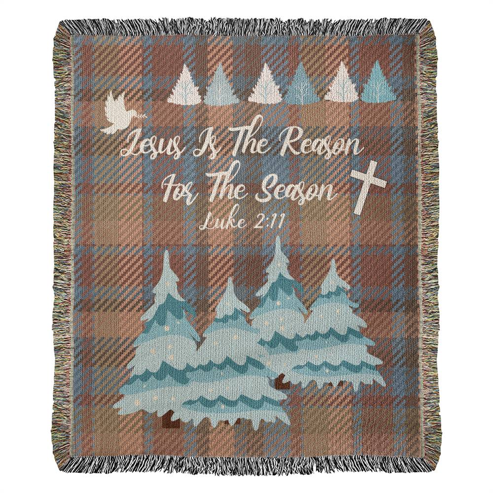 Woven Plaid design blanket with winter trees, cross, and 'Jesus Is The Reason For The Season' message with Luke 2:11 Bible verse.