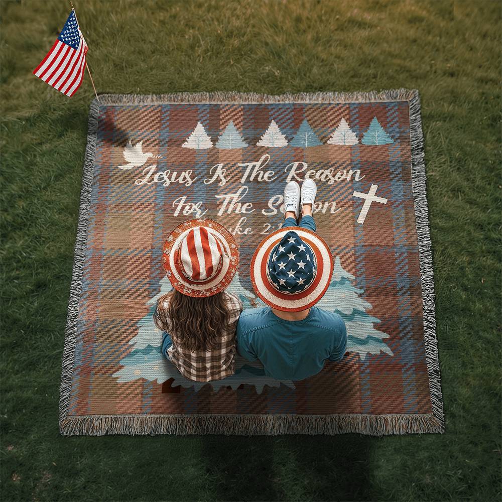 Woven Plaid design blanket with winter trees, cross, and 'Jesus Is The Reason For The Season' message with Luke 2:11 Bible verse.