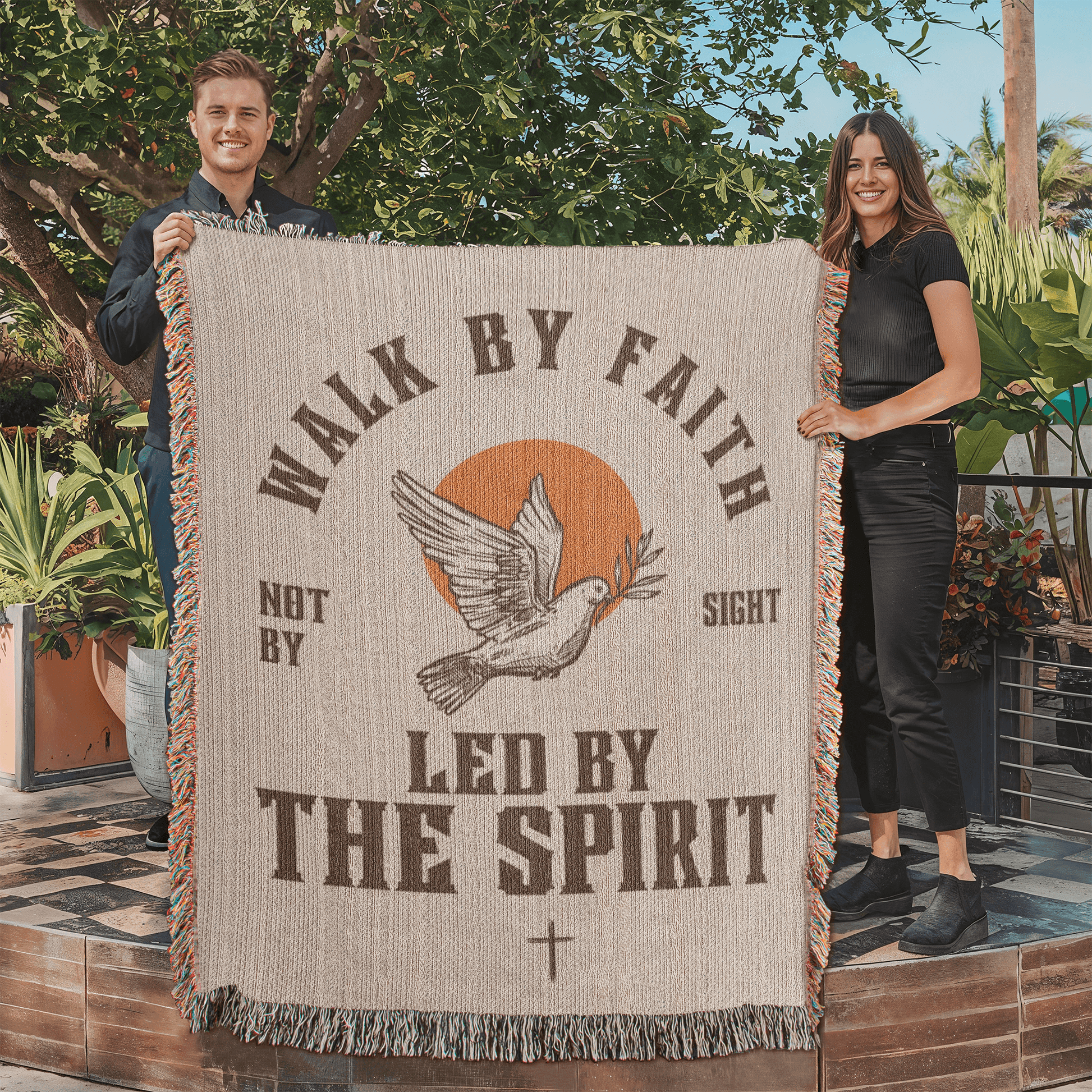 Retro-inspired woven blanket with 'Walk by Faith, Not by Sight' message, dove and sun design, light background, and retro colors.