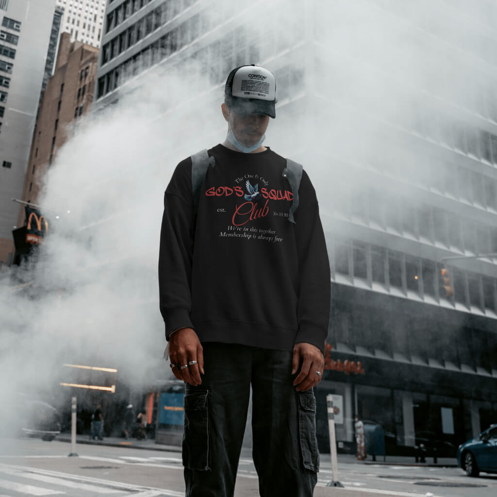 A vintage-inspired "God's Squad" crewneck design featuring a dove and the words "est. 30-33 AD."
