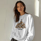 Blessed crewneck with unique cow-print tree design and farmhouse style
