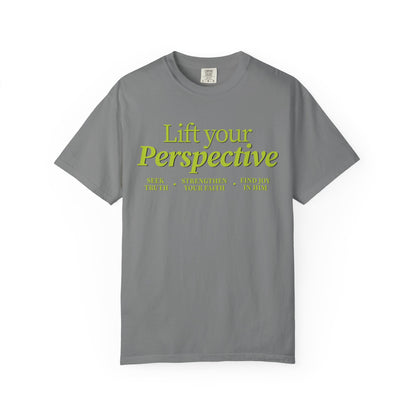 Gray t-shirt with yellow text 'Lift your Perspective' on a white background