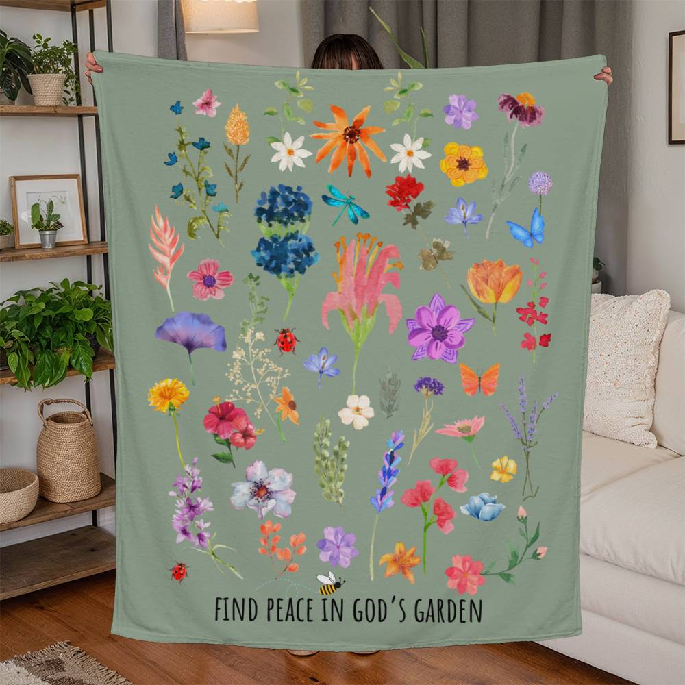 Floral fleece blanket with vibrant flowers, bugs, and 'Find Peace in God's Garden' message. Colorful and nature-inspired Christian blanket.
