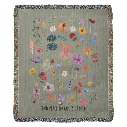 Floral woven blanket with vibrant flowers, bugs, and 'Find Peace in God's Garden' message. Colorful and nature-inspired Christian blanket.
