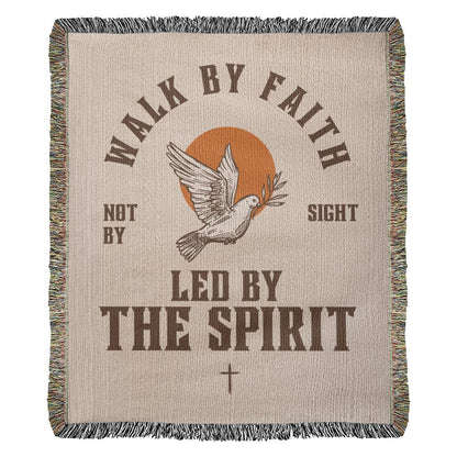 Retro-inspired woven blanket with 'Walk by Faith, Not by Sight' message, dove and sun design, light background, and retro colors.

