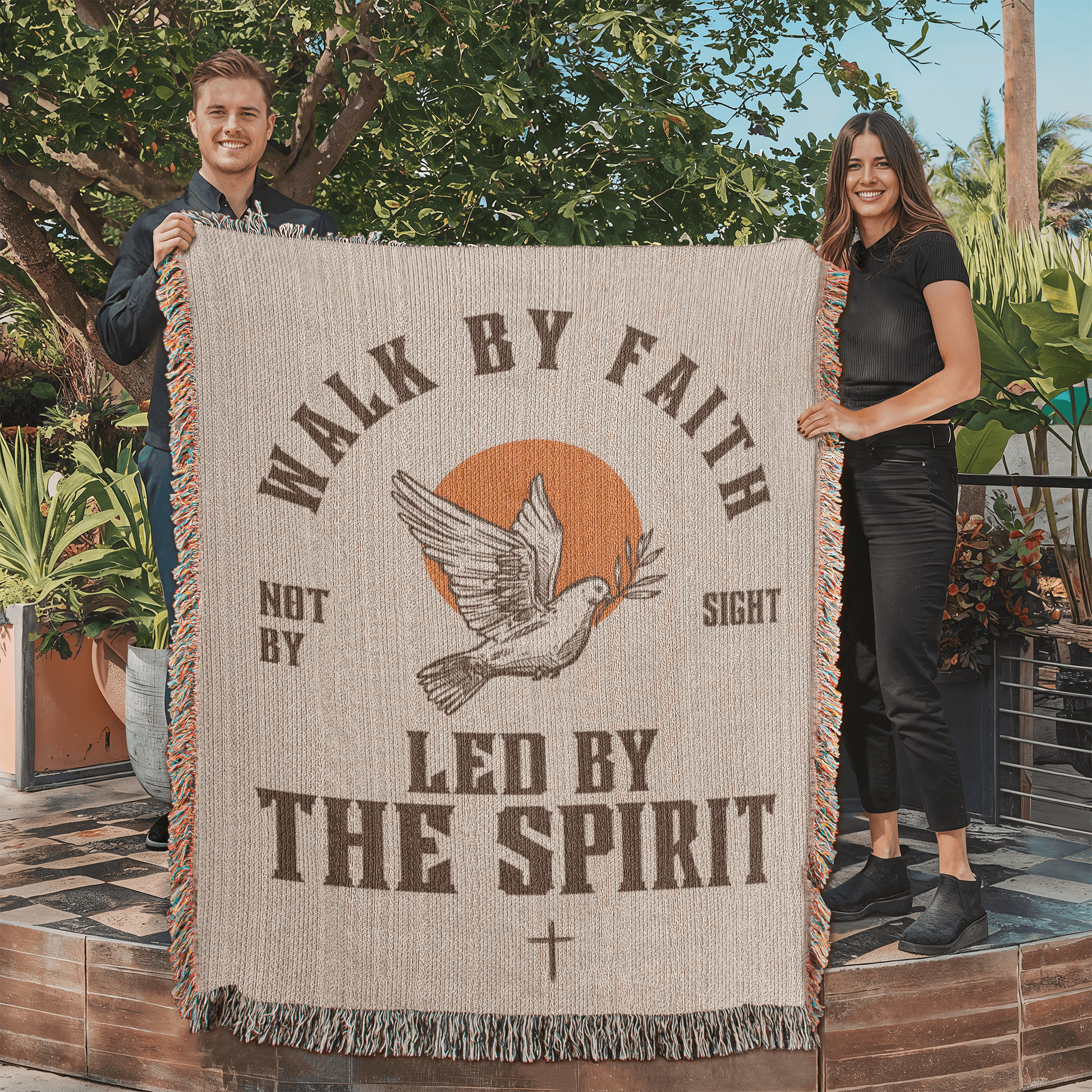 Retro-inspired woven blanket with 'Walk by Faith, Not by Sight' message, dove and sun design, light background, and retro colors.

