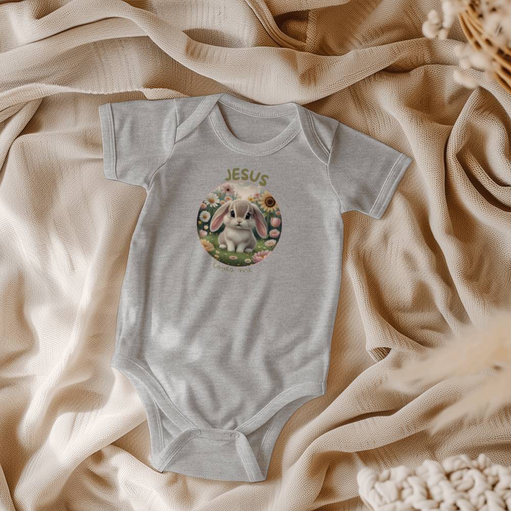 Jesus Loves Me Christian bodysuit with bunny in a flower garden.
